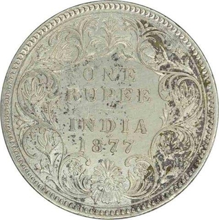 Silver One Rupee Coin of Victoria Empress of Calcutta Mint of 1877.