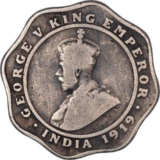 Copper Nickel  Four Annas Coin of King George V of Calcutta Mint of 1919.