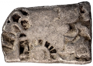 Punch Marked Silver Karshapana coin of Maurya Empire.