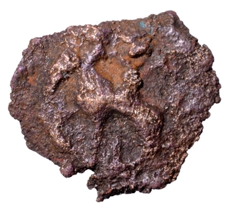 Cast Copper Coin of Ujjaini Region of deity standing on the elephant type.