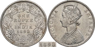 Rare NGC AU Graded Silver One Rupee Coin of Victoria Empress of 1891 (91 over 90) of Bombay Mint.