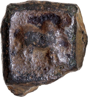 Copper Coin of Sangam Cheras of Bull type with Swastika in the reverse.