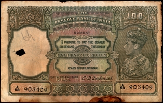 One Hundred Rupees Banknote of King George VI Signed by C D Deshmukh of Bombay Circle of 1943.