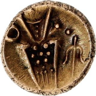 Unattributed Degenerated Kali figure with inverted trident Gold Kali Fanam Coin.