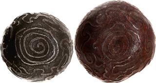 Cast Iron Amulets Ball Money of Java with pseudo Arabic legends.