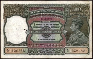 One Hundred Rupees Bank Note of King George VI Signed by C.D. Deshmukh of 1938 of Calcutta Circle.