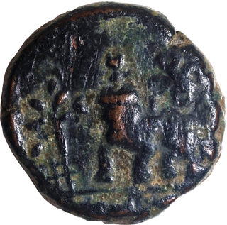 Copper Coin of Ujjaini Region with Lion standing.