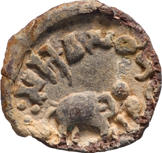 Vasithiputasa Satavahana Lead Coin with Variant Brahmi Letters “E” and “Sa”. The Finest Example with Original Patina and Exceptional Toning.