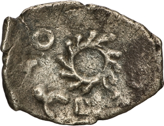 Very Rare Unlisted Type Saurashtra Janapada Punch-Marked Coin with Sun or Chakra with Swastika Symbol from 450–300 BC.