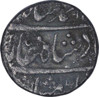 Silver One Rupee Coin of Muhammad Shah of Out of Flan Mint.